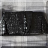H05. Juliette Jake alligator clutch. 